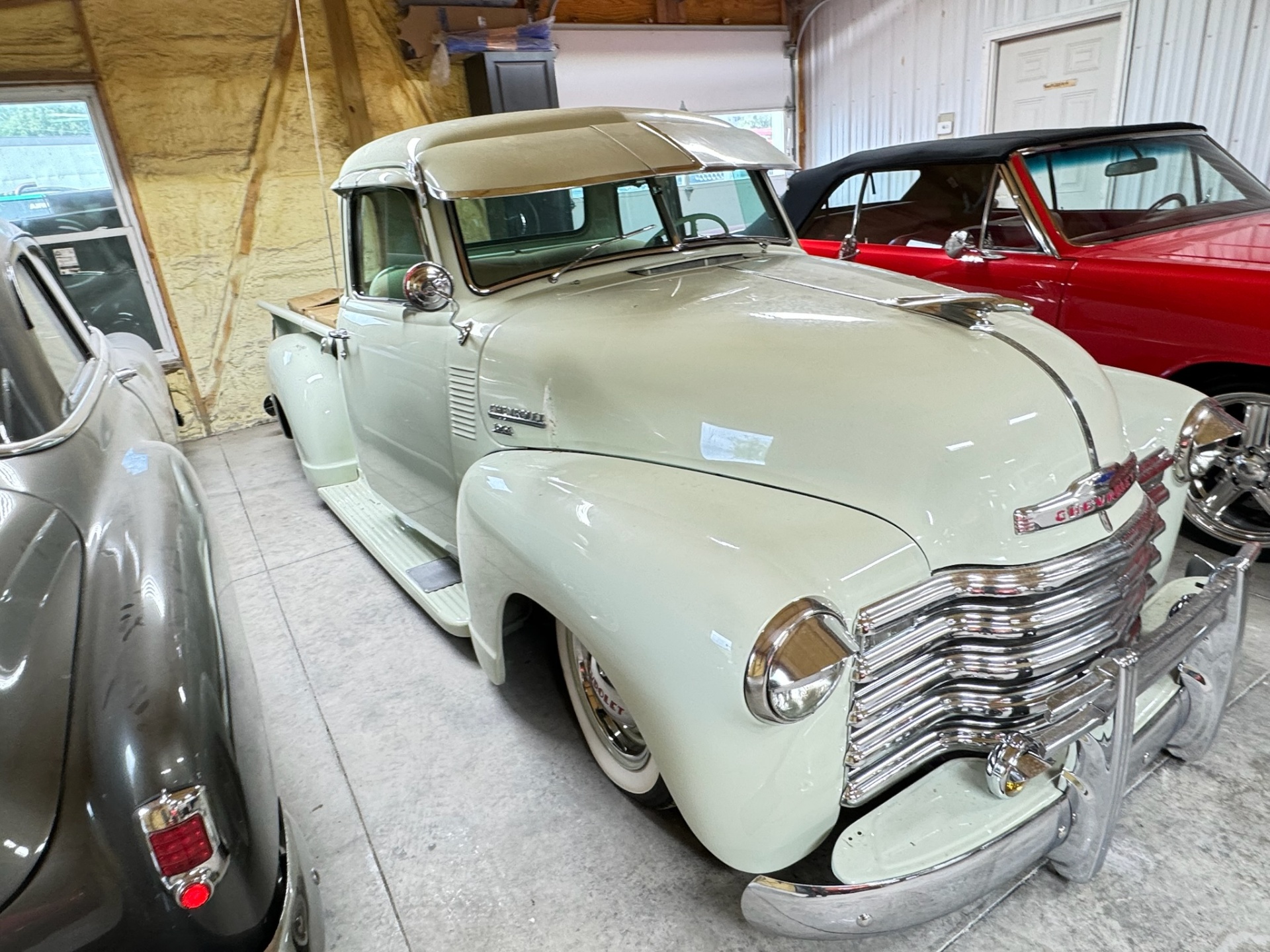 Completed white Chevy truck paint finish