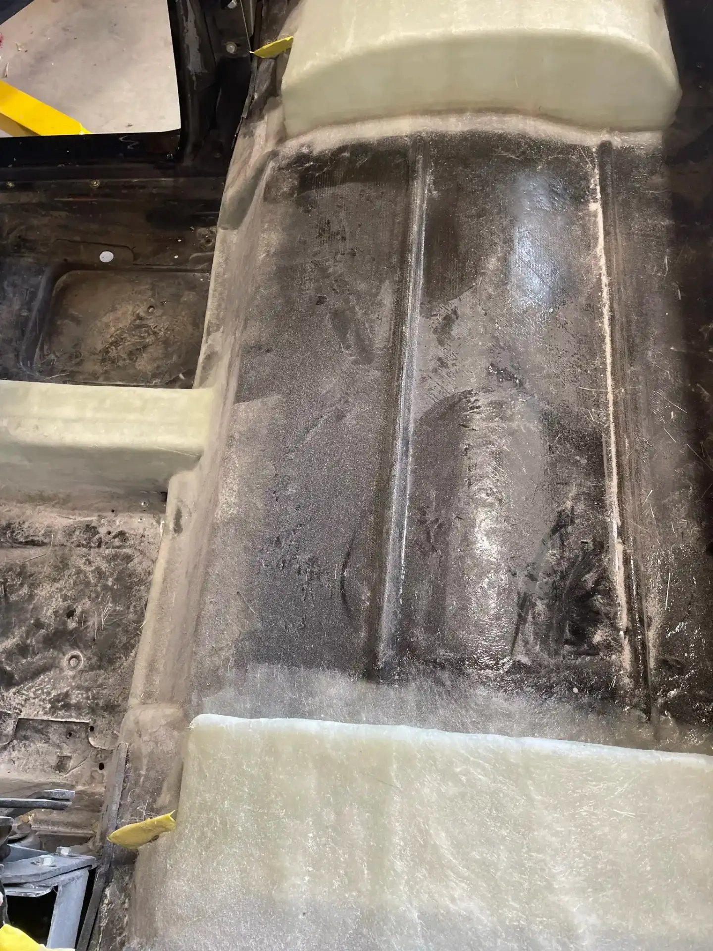 Floor pan with sound deadening material applied